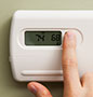 Hand adjusting thermostat